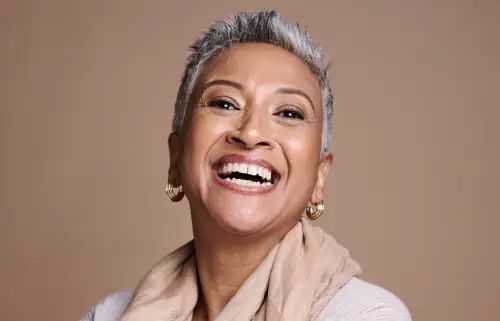 Smiling African woman for Face and Neck Lift